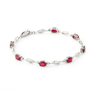 14K GOLD TENNIS BRACELET WITH RUBIES & DIAMONDS